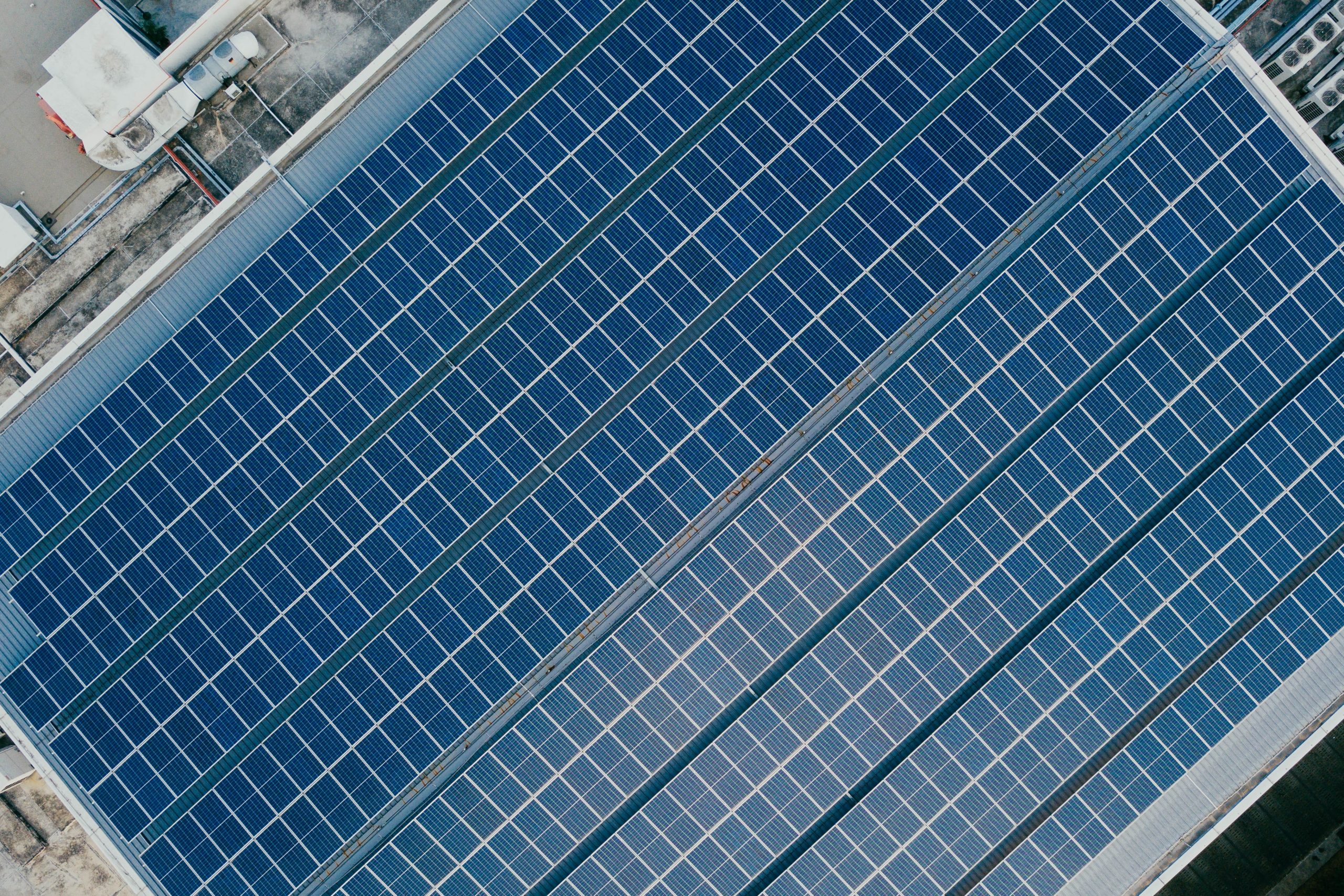 Bird's eye view of solar panels on a rooftop
